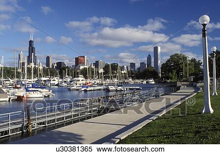 Stock Photography -  harbor, marina, Chicago, Illinois, IL, Downtown skyline of Chicago from Burnham Point Yacht Club on Lake Michigan.. Fotosearch