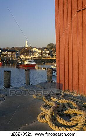 Stock Photography -  harbor, Rockport, fishing boat, Massachusetts, MA, View of fishing boats docked in Rockport Harbor in Rockport from a pier in the fall.. Fotosearch