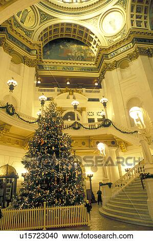 Stock Image -  Harrisburg, PA, State Capitol, State House, Pennsylvania, A beautiful Christmas tree decorates The Capitol Rotunda inside The Pennsylvania State Capitol Building in the capital city of Harrisburg.. Fotosearch