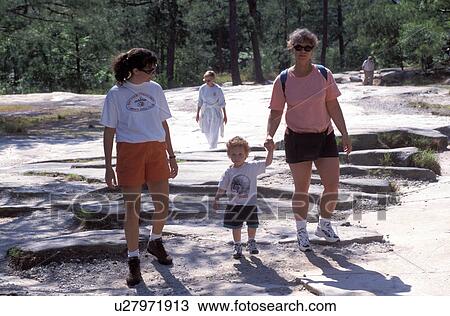 hiking, Georgia's Stone Mountain Park, Stone Mountain, GA, Atlanta, Georgia, Two women and toddler boy walking up Stone Mountain (largest granite rock in the world) in Georgia's Stone Mountain Park. View Large Photo Image Stock Image - hiking, Georgia's Stone Mountain Park, Stone Mountain, GA, Atlanta, Georgia, Two women and toddler boy walking up Stone Mountain (largest granite rock in the world) in Georgia's Stone Mountain Park. . Fotosearch