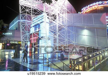 Stock Photo -  Hollywood, California, Los Angeles, CA, Hollywood Entertainment Museum illuminated at night in Hollywood.. Fotosearch