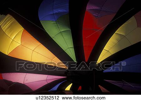 Stock Image -  hot air balloon, Vermont, VT, Stowe, Inside view of hot air balloon at the Stoweflake Hot Air Balloon Festival.. Fotosearch