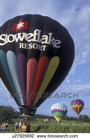 Stock Image -  hot air balloon, Vermont, VT, Stowe, Stoweflake hot air balloon getting ready for take off at the Stoweflake Hot Air Balloon Festival.. Fotosearch