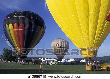 Stock Photography -  hot air balloon, Vermont, VT, Stowe, Hot air balloons getting ready for take off at the Stoweflake Hot Air Balloon Festival.. Fotosearch