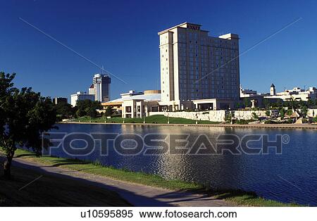 hotel, Wichita, KS, Kansas, View of the Hyatt Regency Hotel in downtown Wichita from across the Big Arkansas River. View Large Photo Image Stock Photography - hotel, Wichita, KS, Kansas, View of the Hyatt Regency Hotel in downtown Wichita from across the Big Arkansas River.. Fotosearch
