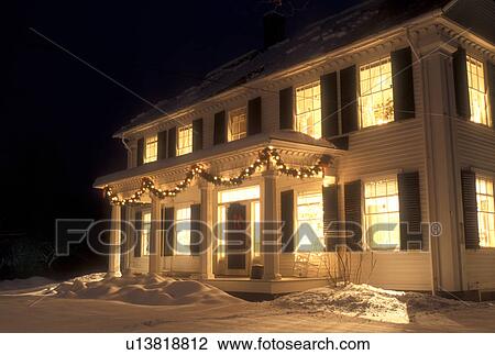 house, decorations, Christmas, snow, winter, The windows of a house are illuminated at night for the Christmas holiday season in Townshend in Windham County in the state of Vermont. View Large Photo Image Stock Image - house, decorations, Christmas, snow, winter, The windows of a house are illuminated at night for the Christmas holiday season in Townshend in Windham County in the state of Vermont. . Fotosearch