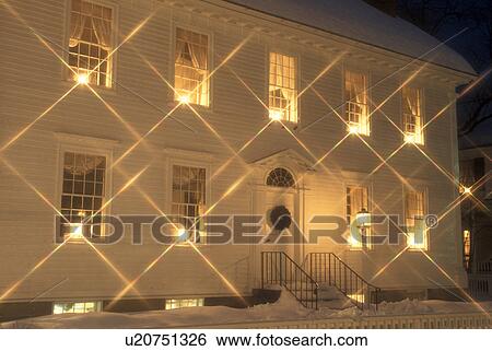 house, home, Christmas, holiday, starlight, decorations, snow, winter, Yellow Christmas candles glow in the windows of the Woodstock Historical Society for the Christmas holiday season in Woodstock at night in Windsor County in the state of Vermont. View Large Photo Image Stock Photograph - house, home, Christmas, holiday, starlight, decorations, snow, winter, Yellow Christmas candles glow in the windows of the Woodstock Historical Society for the Christmas holiday season in Woodstock at night in Windsor County in the state of Vermont. . Fotosearch