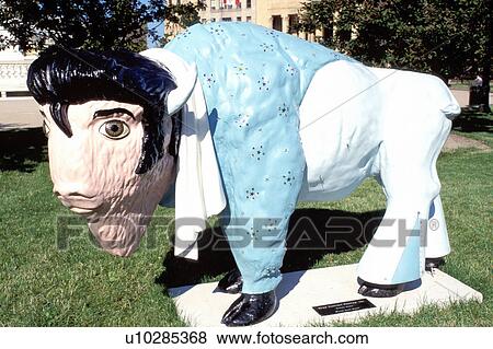 Stock Photo -  humor, buffalo statue, Elvis, Buffalo, NY, New York, Buffalo Rocks statue at Niagara Square in downtown Buffalo.. Fotosearch