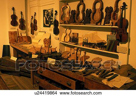 Picture -  instruments, music, university, Vermillion, SD, South Dakota, University of South Dakota, Demonstration of violin making displayed inside the America's Shrine to Music Museum at the University of South Dakota.. Fotosearch