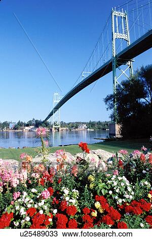 Stock Image -  International Bridge, Thousand Islands, Alexandria Bay, New York, St. Lawrence River, NY, International Bridge crosses the St. Lawrence River into Ontario, Canada.. Fotosearch
