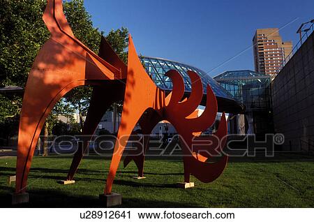Stock Image -  Kansas City, MO, Missouri, Red Sculpture outside the Crown Center in Kansas City.. Fotosearch