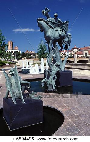 Kansas City, MO, Missouri, Statue on the riverwalk along Brush Creek. View Large Photo Image Stock Photography - Kansas City, MO, Missouri, Statue on the riverwalk along Brush Creek.. Fotosearch