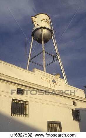 Stock Image -  Kingsburg, California, CA, City Jail below the Swedish Coffee Pot Water Tank in the Swedish Village of Kingsburg.. Fotosearch