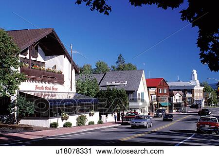 Stock Image -  Lake Placid, New York, NY, Adirondacks, Shops along Main Street in downtown Lake Placid.. Fotosearch