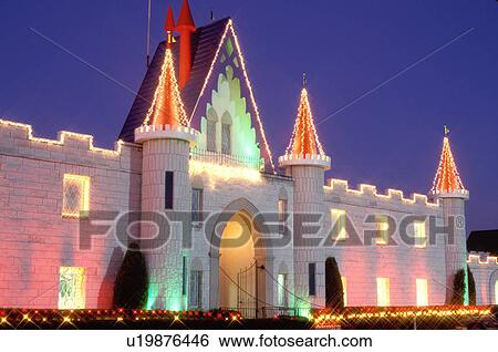 Stock Photograph -  Lancaster County, Pennsylvania Dutch Country, Amish Country, PA, Pennsylvania, Lancaster, Dutch Wonderland Family Amusement Park entrance is illuminated at night in Lancaster.. Fotosearch