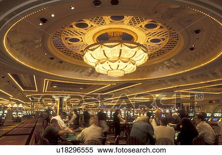 Las Vegas, casino, gamble, Nevada, NV, The Strip, People gambling inside the casino at the Monte Carlo Resort & Casino in Las Vegas, the Entertainment Capital of the World. View Large Photo Image Stock Photography - Las Vegas, casino, gamble, Nevada, NV, The Strip, People gambling inside the casino at the Monte Carlo Resort & Casino in Las Vegas, the Entertainment Capital of the World.. Fotosearch