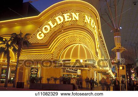 Stock Photo -  Las Vegas, casino, Nevada, NV, Glitter Gulch, The Golden Nugget Casino on The Fremont Street Experience at night in downtown Las Vegas, the Entertainment Capital of the World.. Fotosearch