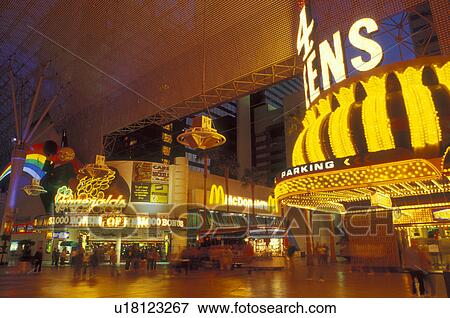 Stock Photo -  Las Vegas, casino, Nevada, NV, Glitter Gulch, Casinos on The Fremont Street Experience in downtown Las Vegas at night.. Fotosearch