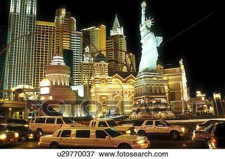 Las Vegas, casino, NV, Nevada, New York-New York, The Strip, Replica of the Statue of Liberty and other landmarks at New York-New York Hotel & Casino at night on The Strip in Las Vegas, the Entertainment Capital of the World. View Large Photo Image Stock Photo - Las Vegas, casino, NV, Nevada, New York-New York, The Strip, Replica of the Statue of Liberty and other landmarks at New York-New York Hotel & Casino at night on The Strip in Las Vegas, the Entertainment Capital of the World.. Fotosearch