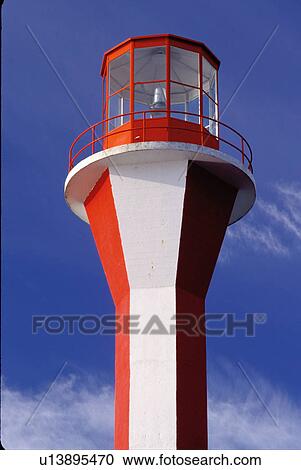 Stock Image -  lighthouse, light, Nova Scotia, Yarmouth, NS, Canada, Cape Forchu Lighthouse along the coast in Yarmouth on the Atlantic Ocean. . Fotosearch