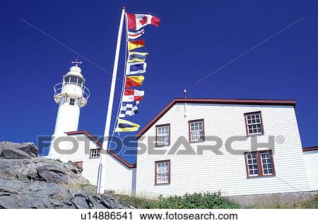 Stock Image -  lighthouse, Newfoundland, NF, Canada, Lobster Cove Head Lighthouse on the Gulf of St. Lawrence. Gros Morne National Park.. Fotosearch