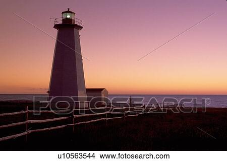 lighthouse, sunrise, sunset, Newfoundland, NF, Canada, Lighthouse at Cape Anguilla at sunset on the Gulf of St. Lawrence. View Large Photo Image Picture - lighthouse, sunrise, sunset, Newfoundland, NF, Canada, Lighthouse at Cape Anguilla at sunset on the Gulf of St. Lawrence.. Fotosearch