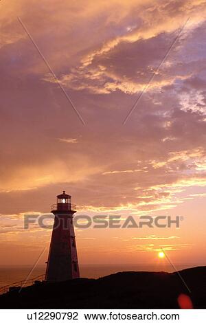 lighthouse, sunrise, sunset, Newfoundland, NF, Canada, Lighthouse at Cape Spear National Historic Site, Easternmost Point of North America at sunrise on the Atlantic Ocean. View Large Photo Image Stock Image - lighthouse, sunrise, sunset, Newfoundland, NF, Canada, Lighthouse at Cape Spear National Historic Site, Easternmost Point of North America at sunrise on the Atlantic Ocean.. Fotosearch
