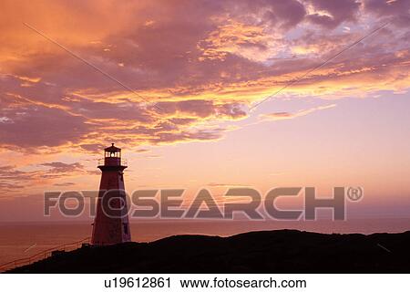 lighthouse, sunrise, sunset, Newfoundland, NF, Canada, Lighthouse at Cape Spear National Historic Site, Easternmost Point of North America at sunrise on the Atlantic Ocean. View Large Photo Image Stock Image - lighthouse, sunrise, sunset, Newfoundland, NF, Canada, Lighthouse at Cape Spear National Historic Site, Easternmost Point of North America at sunrise on the Atlantic Ocean.. Fotosearch