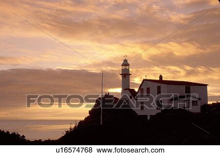 lighthouse, sunrise, sunset, Newfoundland, NF, Canada, Lobster Cove Head Lighthouse on the Gulf of St. Lawrence at sunset. Gros Morne National Park. View Large Photo Image Stock Photo - lighthouse, sunrise, sunset, Newfoundland, NF, Canada, Lobster Cove Head Lighthouse on the Gulf of St. Lawrence at sunset. Gros Morne National Park.. Fotosearch