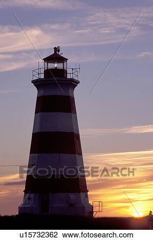 lighthouse, sunset, sunrise, Nova Scotia, Bay of Fundy, NS, Canada, Western Lighthouse at sunset along the coast of the Bay of Fundy on Briar Island on the Atlantic Ocean. View Large Photo Image Stock Image - lighthouse, sunset, sunrise, Nova Scotia, Bay of Fundy, NS, Canada, Western Lighthouse at sunset along the coast of the Bay of Fundy on Briar Island on the Atlantic Ocean. . Fotosearch