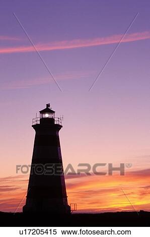 lighthouse, sunset, sunrise, Nova Scotia, Bay of Fundy, NS, Canada, Western Lighthouse at sunset along the coast of the Bay of Fundy on Briar Island on the Atlantic Ocean. View Large Photo Image Stock Photography - lighthouse, sunset, sunrise, Nova Scotia, Bay of Fundy, NS, Canada, Western Lighthouse at sunset along the coast of the Bay of Fundy on Briar Island on the Atlantic Ocean. . Fotosearch