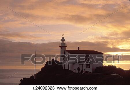 lighthouse, sunset, sunrise, Newfoundland, NF, Canada, Gros Morne National Park from Boone Bay at sunset at Morris Point. View Large Photo Image Stock Image - lighthouse, sunset, sunrise, Newfoundland, NF, Canada, Gros Morne National Park from Boone Bay at sunset at Morris Point.. Fotosearch