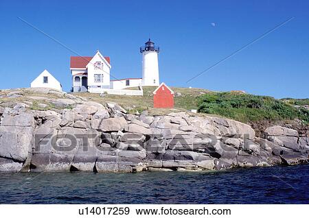 Stock Photo -  lighthouse, York, Maine, ME, York Harbor, Cape Neddick Light, Nubble Lighthouse, on the rocky coast on the Atlantic Ocean. . Fotosearch