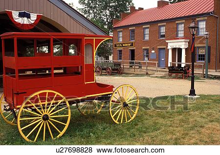 living history museum, Columbus, OH, Ohio, Ohio Village, red carriage outside a 19th Century Village. Ohio Historical Society. View Large Photo Image Stock Photo - living history museum, Columbus, OH, Ohio, Ohio Village, red carriage outside a 19th Century Village. Ohio Historical Society.. Fotosearch