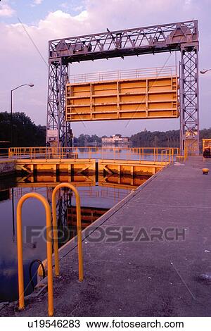 Stock Image -  locks, canal, Seneca Falls, Finger Lakes, New York, NY, Double locks on Cayuga-Seneca Canal. Locks create a 49 foot change in elevation along the canal.. Fotosearch