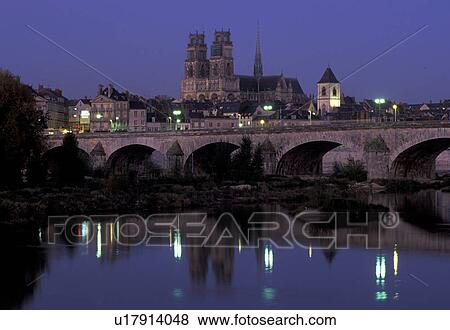 Loire Castle Region, France, Orleans, Loire Valley, Loiret, Centre, Europe, Reflection of the town of Orleans and the stone bridge in the Loire River in the evening. View Large Photo Image Stock Photo - Loire Castle Region, France, Orleans, Loire Valley, Loiret, Centre, Europe, Reflection of the town of Orleans and the stone bridge in the Loire River in the evening.. Fotosearch