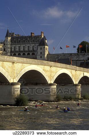 Stock Image -  Loire Valley, France, Amboise, Loire Castle Region, Europe, Chateau Amboise a 15th century castle across the Loire River. Kayaking on the river. . Fotosearch