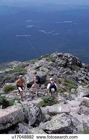 Stock Image -  Maine, Mt. Katahdin, Appalachian Trail, Baxter Park, ME, People hiking the rugged Hunt Trail part of the Appalachian Trail on Mt. Katahdin in Baxter State Park. . Fotosearch