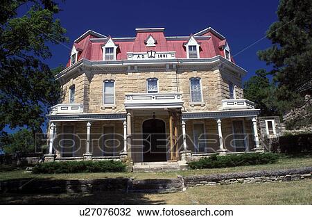 Stock Image -  mansion, Strong City, Flint Hills, KS, Kansas, The Limestone Mansion at Z Bar Springhill Ranch at the Tallgrass Prairie National Preserve.. Fotosearch