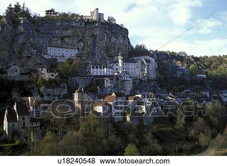 Stock Photo -  medieval, France, Rocamadour, Dordogne, Perigord, Midi-Pyrenees, Lot, Europe, The fortified pilgrimage town of Rocamadour cascades down the terraced limestone cliffs. . Fotosearch