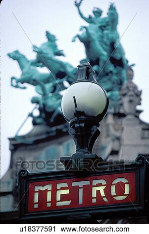 Stock Image -  Metro, Paris, France, Europe, Metro station entrance sign along Avenue des Champs Elysees.. Fotosearch