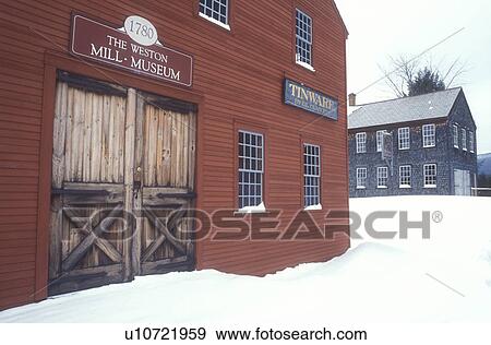 Stock Photo -  mill, sawmill, museum, winter, snow, The red Weston Bowl Mill Museum in the snow in the village of Weston in Windsor County in the state of Vermont. . Fotosearch