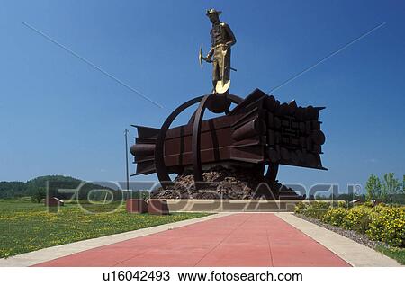 mining, MN, Minnesota, Chisholm, Mesabi Iron Range, The Iron Man Memorial at the Ironwood Discovery Center. View Large Photo Image Stock Image - mining, MN, Minnesota, Chisholm, Mesabi Iron Range, The Iron Man Memorial at the Ironwood Discovery Center.. Fotosearch