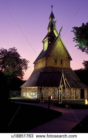 Stock Image -  MN, Minnesota, Moorhead, Stave Church in the evening at the Heritage Hjemkomst Interpretive Center. Fotosearch