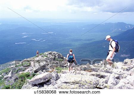 Mt. Katahdin, Maine, Appalachian Trail, Baxter Park, ME, hiking, People hiking the rugged Hunt Trail part of the Appalachian Trail on Mt. Katahdin in Baxter State Park. View Large Photo Image Stock Photo - Mt. Katahdin, Maine, Appalachian Trail, Baxter Park, ME, hiking, People hiking the rugged Hunt Trail part of the Appalachian Trail on Mt. Katahdin in Baxter State Park. . Fotosearch