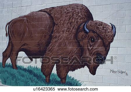 Stock Photography -  mural, bison, Council Grove, KS, Kansas, Flint Hills, Mural of a Buffalo painted on the side of a wall in downtown Council Grove.. Fotosearch