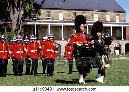 Stock Image -  New Brunswick, Fredericton, NB, Canada, Re-enactment of the Changing of the Guards at Officer's Square in Fredericton. Soldiers marching in formation.. Fotosearch