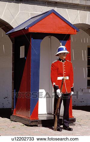 Stock Image -  New Brunswick, Fredericton, NB, Canada, Soldier standing guard at Officer's Square in Fredericton. Changing of the Guard.. Fotosearch