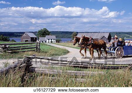 Stock Photo -  New Brunswick, NB, Canada, Wagon rides at King's Landing Historical Settlement next to Joslin Farm.. Fotosearch