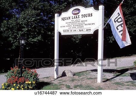Stock Photo -  New Hampshire, Holderness, NH, Squam Lake Tours sign, movie location of On Golden Pond.. Fotosearch